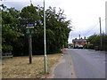 A1152 The Street & Eyke Village Sign in IP12 2QQ