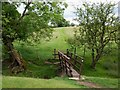 Footbridge over stream in BB12 7RT