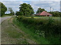 Road near Low Spinney Wind Farm in LE17 5NB