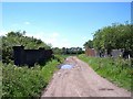 Farm track over dismantled railway near Wilson's Farm in BL5 2DP