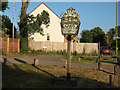 Sign for Hertford Heath village in SG13 7RH