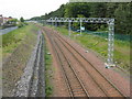 Edinburgh-Airdrie railway from the Moss Road bridge in EH54 8AB