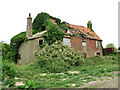 Old farm cottages by Carlton Marshes Wildlife Centre in Carlton Colville