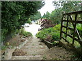 Footpath steps climbing away from the A29 in RH20 1BD