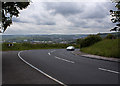 A sharp bend in the road approaching Earcroft in BB3 0PF