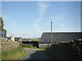 Approaching buildings of Todgill Farm, Ireby in Ireby