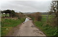 Open-sided farm building alongside a lane to the A48, Monmouthshire in Caerwent Community