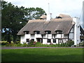 Large thatched house at Sindlesham in RG41 5BJ