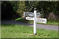 Signpost at Cowbeech Hill in BN27 4JA