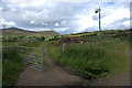 Gate and mobile phone antenna, Drumfork, Glenshee in PH10 7LL