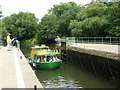 A "Kingfisher" pleasure boat enters Teston lock in ME18 5AR