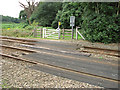 View across Bear's Grove level crossing, Wroxham in NR13 6EZ