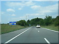Northbound exit slip road at junction 10 in SG7 5EN