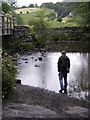 Ford and footbridge on River Brathay in LA22 9NT