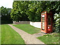 Phonebox outside St James, Woodmancott in SO21 3BN