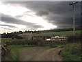 Coastley Farm under a threatening sky in NE46 2PQ