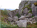Dramatic quarry-like rock cleft north of Beinn Bhreac in FK8 3XJ