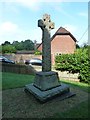 War memorial in the churchyard at St Mary Ewshot in GU10 5AN