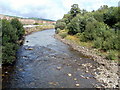 River Neath flows towards Chain Road, Glynneath in SA11 5HH