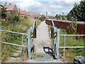 Footpath alongside the flood prevention wall, Glynneath in SA11 5HH