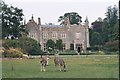 Zebras and Manor House, Bradwell Grove in OX18 4JP