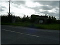 Phone box and bus shelter at a Road Junction in SA66 7TY