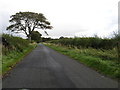 Rural road heading past the lands of Keith Mains in EH35 5NL