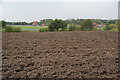 Ploughed field in front of Glazebury Sewage Treatment Works in Fowley Common