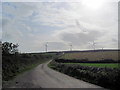 Lane from Neuadd towards wind farm in Llanbadrig Community