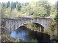 Stone arch of the old Bridge of Bogendreip in AB31 6LP