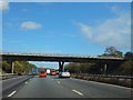 B3018 bridge over M4 and Hammond's Wood in RG10 0QR
