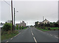 A486 approaches crossroads in Maen-y-groes in SA45 9RL