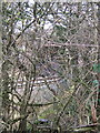 Railway, fence and bridge seen through thicket in BS37 7PX