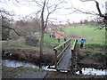 Footbridge over Hodge Beck Pennyholme Wath in YO62 7JG
