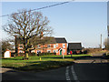 Red-brick cottages at Bacon's Green, Holton St Mary in CO7 6NJ