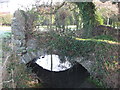 A stile and bridge combined over the Parish Brook Nailsea in BS48 4BU