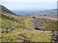 Roadway and derelict shed at Marchlyn Quarry in LL55 3EP