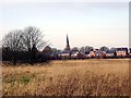Grassland, with a view towards Sefton Church in the next square in L31 8BX