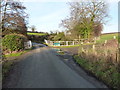 A country lane and a bridge over the Hook-a-Gate brook in SY5 8AZ