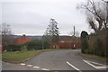 Road junction at Plaxtol Spout in TN15 0QZ