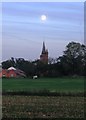 St John the Baptist, Aldford, by moonlight in CH3 6JF