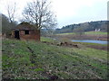 Small, derelict barn on the riverbank in WV16 4SN