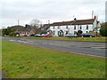 Row of three white cottages, Penhow in NP26 3AG