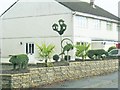 Roadside topiary in SA14 7PZ