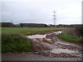 Entrance to farmland west of Chippenham in SN14 0RH