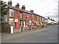 Terraced housing in Holmes Chapel Road in CW12 4HF