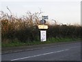 Signpost to Leavenheath Village Hall in CO6 4US