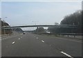 M58 motorway - footbridge at junction 4 in WN8 8AP