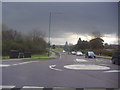 Mini roundabout on Southern Way and Kingsmoor Road in CM19 4LE