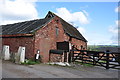 Red brick farm buildings near Upper Nobut in ST10 4QH